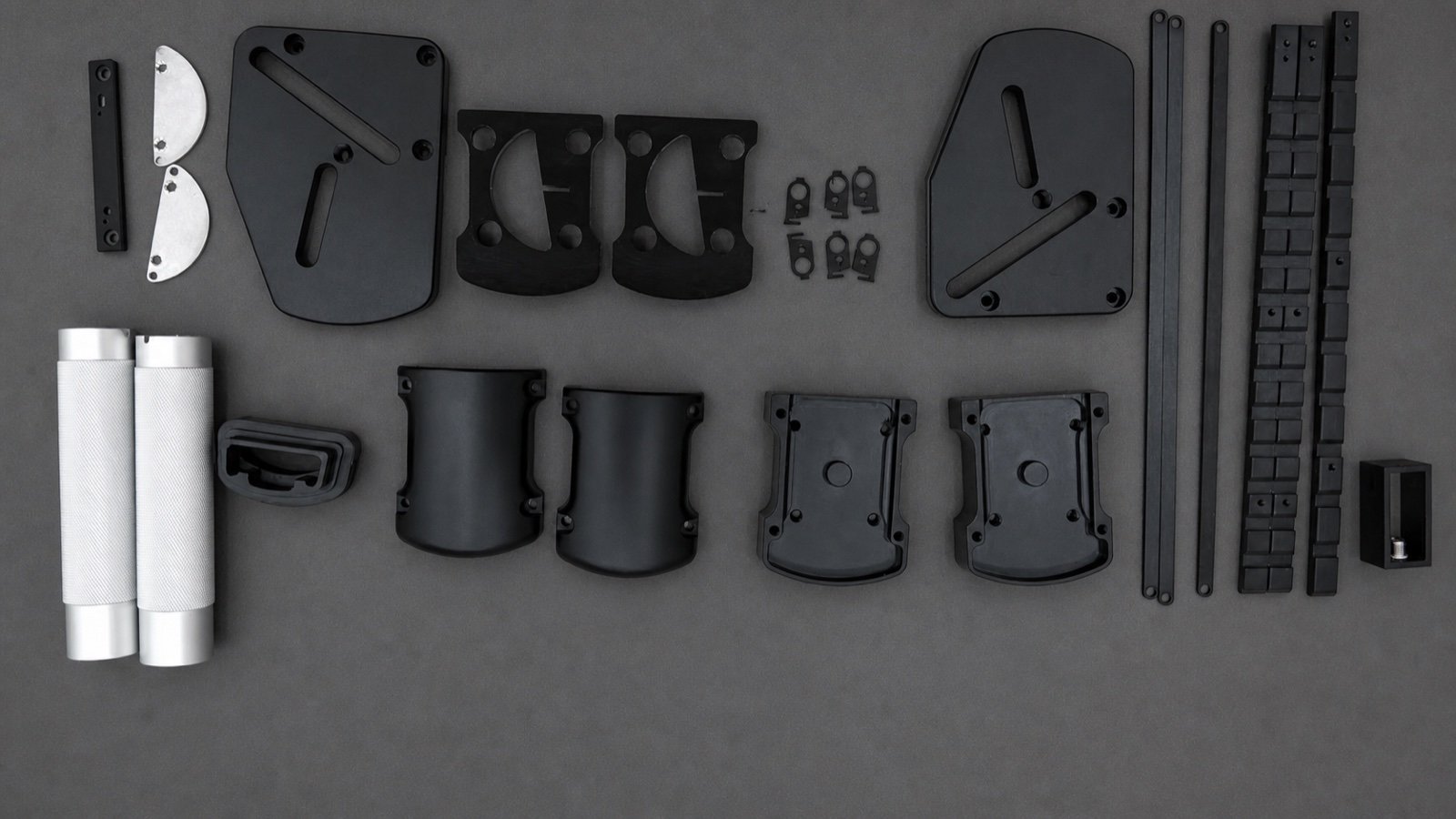 Anonymized real mixed-material component set used to review product interfaces and manufacturing routes